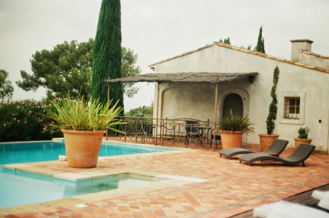 Mediterranean style villa exterior with pool and terrace
