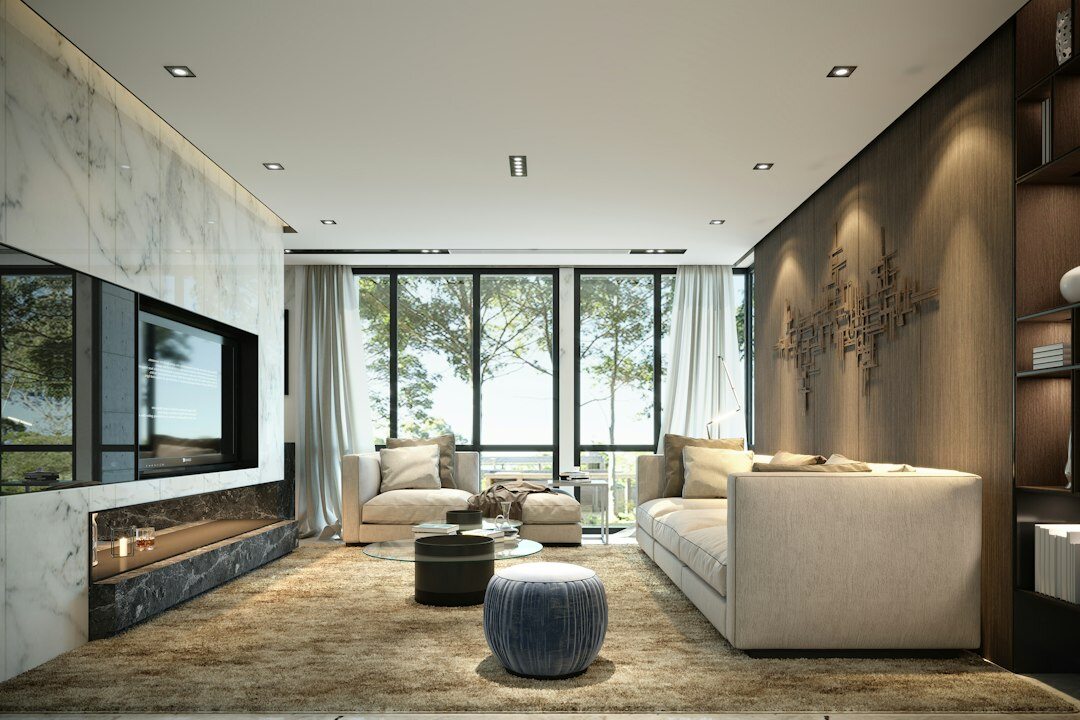 Elegant luxury living room with velvet sofa and large windows
